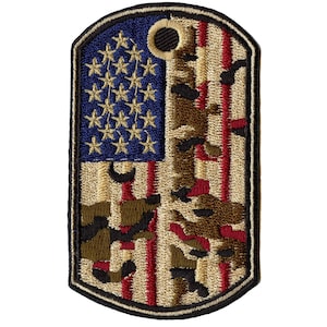 May include: A tan, brown, and red embroidered patch with a camouflage pattern and an American flag design. The flag is blue with white stars and red and white stripes.