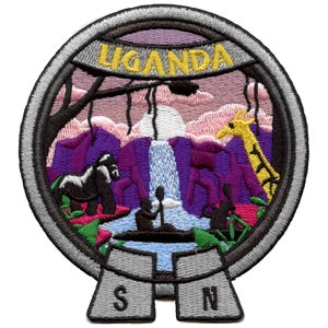 May include: Embroidered patch with a colorful scene of a waterfall, mountains, a gorilla, a giraffe, and two people in a canoe. The patch is circular with a gray border and the word "UGANDA" in yellow lettering at the top. The bottom of the patch has a gray ribbon with the letters "S" and "N" on it.