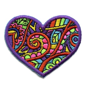 May include: A colorful embroidered patch in the shape of a heart. The heart is filled with a swirling pattern of red, orange, yellow, green, blue, and purple thread. The outline of the heart is a dark purple thread.