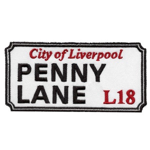 May include: White and black embroidered patch with the text "City of Liverpool Penny Lane L18".