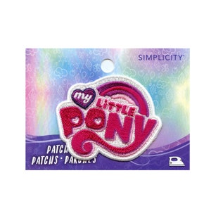 May include: An iron-on patch featuring the My Little Pony logo in pink and white with a heart and rainbow. The patch is on a white background with a pink and purple design.