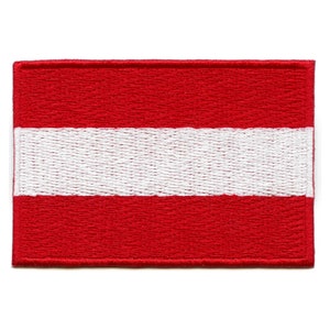 May include: A red and white embroidered patch with the flag of Austria.