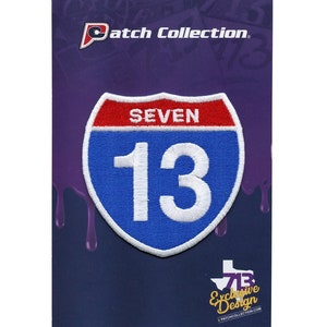 May include: A blue and red highway sign patch with the text "SEVEN 13" in white. The patch is on a purple background with a dripping paint effect.