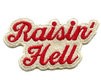 May include: White embroidered patch with red lettering that reads "Raisin' Hell".