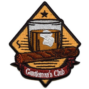 May include: Embroidered patch featuring a glass of whiskey with a brown and white design, a brown cigar, and a red banner with the text "Gentleman's Club".