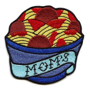 May include: Embroidered iron-on patch featuring a bowl of spaghetti and meatballs with the text "MOM'S" on a blue banner.