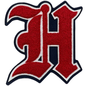 May include: Red felt letter H with white outline and navy blue backing. The letter is in a stylized, old-fashioned font.