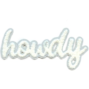 May include: White iron-on patch with the word "Howdy" in a cursive font.