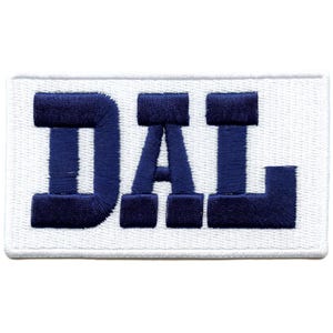 May include: A white embroidered patch with the letters "DAL" in navy blue.