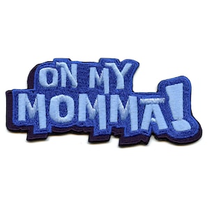 May include: Blue and white embroidered patch with the text "On My Momma!"