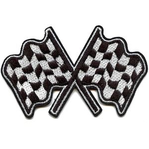 May include: Two black and white checkered racing flags crossed over each other. The flags are embroidered and have a white outline.