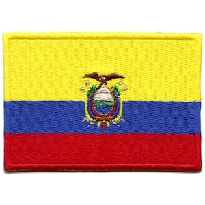 May include: An embroidered patch of the Ecuadorian flag. The flag is yellow, blue, and red with the Ecuadorian coat of arms in the center.