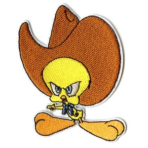 May include: An embroidered iron-on patch featuring Tweety Bird from Looney Tunes. Tweety is wearing a brown cowboy hat and a blue neckerchief. He is pointing with his right wing and has an angry expression on his face.