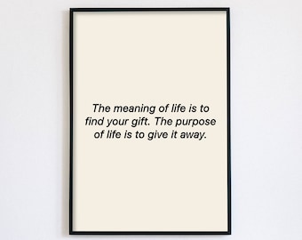 May include: A black framed print with a white background and black text that reads "The meaning of life is to find your gift. The purpose of life is to give it away."
