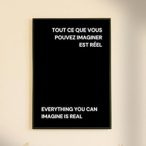 May include: Black and white framed print with the text "Tout ce que vous pouvez imaginer est réel" in French and "Everything you can imagine is real" in English.