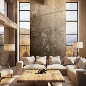 Può includere: Un divano angolare marrone chiaro con cuscini bianchi in un soggiorno con una grande finestra e un tavolino da caffè in legno. Una piccola statuetta di orso marrone è sul tavolo.