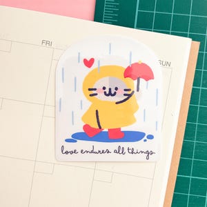 Love Endures All Things - Adesivo trasparente laminato per laptop e telefono - Diari, quaderni, pianificatori, diari, adesivi decorativi