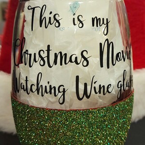 This is my Christmas movie watching wine glass, truck, red and green