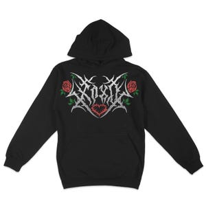 May include: Black hooded sweatshirt with a silver graphic of the word "EXIST" with roses and a heart on the front.