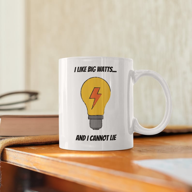 White ceramic mug with I Like Big Watts funny electrician quote