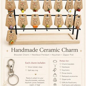 May include: A display rack holding twenty-two assorted handmade ceramic charms on brown cards, each featuring a silver split ring. The charms depict various food items and symbols. Text includes Handmade Ceramic Charm, Bracelet Charm, Necklace Pendant, Keychain, Zipper Pull, and Each charm includes: Silver lobster clasp, Split key ring.