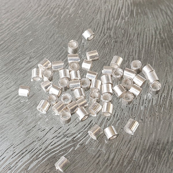 Perles à écraser argentées 2 x 2 mm, 20 pièces