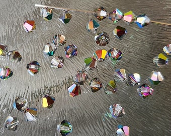 Swarovski crystal bicone kraaltjes 4 mm, vitrail medium, per 20 stuks
