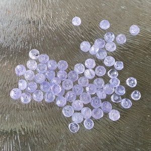 Tanzanite beads round, facet, 3 mm, per 20 pieces