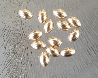 Goldfilled bead oval, 3 x 5 mm, per 2 pieces
