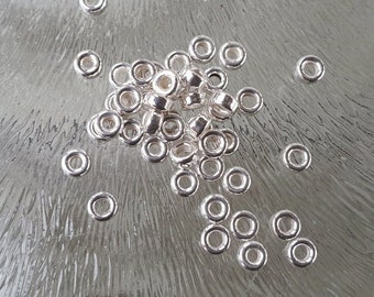Silver spacer donut, fine 3.2 mm, per 20 pieces