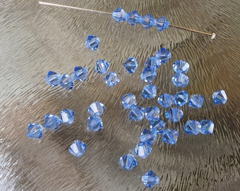 Swarovski crystal bicone beads 4 mm, light sapphire, per 20 pieces
