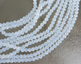 Opalite beads, facet cut 4 mm, per 2 strands of 32 cm