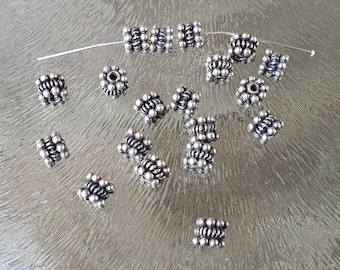 Zilveren kraaltjes dubbele daisy spacer 4 x 5 mm, per 6 stuks
