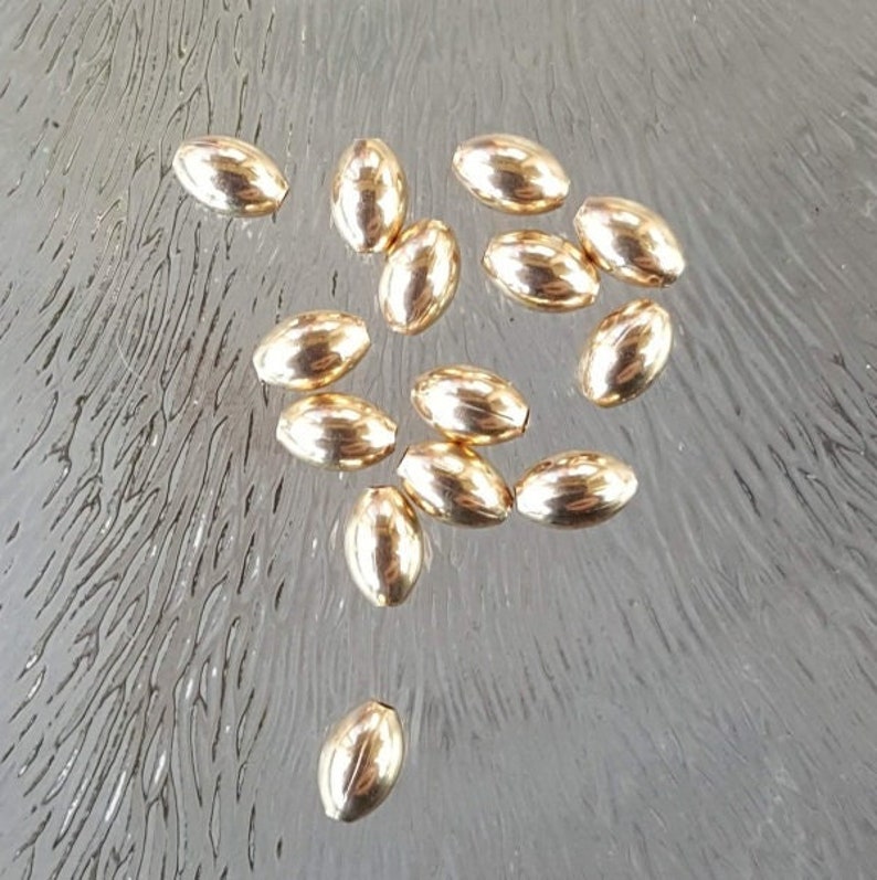 Goldfilled kraal ovaal, 3 x 5 mm, per 2 stuks afbeelding 1