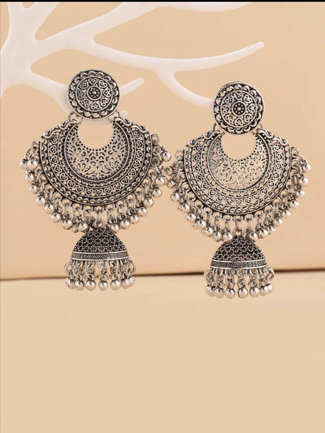 Small black shop metal earrings