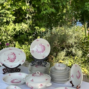 Limoges porcelain service with pink floral motifs by Chapart Frères