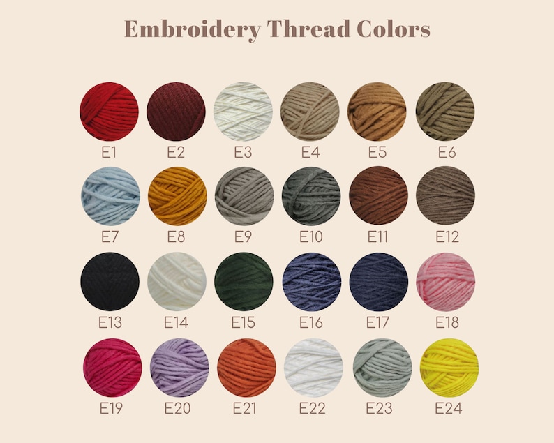 May include: A color chart of embroidery thread options. The image displays 24 different thread colors arranged in a grid, each labeled with a number. The colors range from red and black to blue and yellow, with the text "Embroidery Thread Colors" at the top.