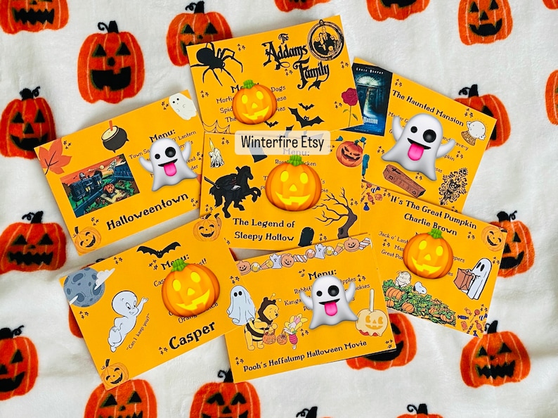 May include: A set of 10 Halloween-themed printable cards featuring various characters and movie titles. The cards are yellow with orange and black accents. The cards feature images of ghosts, pumpkins, and other Halloween characters. The text on the cards includes "Halloweentown", "The Legend of Sleepy Hollow", "The Addams Family", "The Haunted Mansion", "It's The Great Pumpkin Charlie Brown", and "Pooh's Heffalump Halloween Movie".