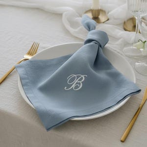 embroidered linen napkin personalized monogram napkin wedding table decor luxury dinner table napkin display custom last name initial napkin embroidered cloth napkin wedding reception tablescape bridal shower table decor baby shower table setting thanksgiving dinner table decor christmas dining table napkins housewarming gift personalized home decor wedding gift newlywed gift rehearsal dinner table display elegant linen napkins hostess gift custom embroidered napkins heirloom table linen luxury