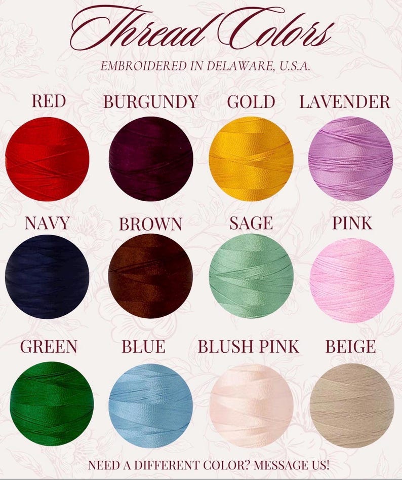 May include: A color chart titled Thread Colors, Embroidered in Delaware, U.S.A. featuring twelve circular thread samples in red, burgundy, gold, lavender, navy, brown, sage, pink, green, blue, blush pink, and beige with the text Need a different color? Message us!