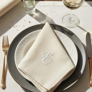 embroidered linen napkin personalized monogram napkin wedding table decor luxury dinner table napkin display custom last name initial napkin embroidered cloth napkin wedding reception tablescape bridal shower table decor baby shower table setting thanksgiving dinner table decor christmas dining table napkins housewarming gift personalized home decor wedding gift newlywed gift rehearsal dinner table display elegant linen napkins hostess gift custom embroidered napkins heirloom table linen luxury