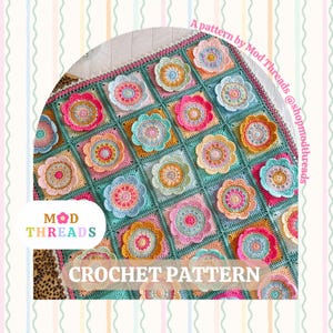May include: A crochet blanket with a floral design. The blanket is made of squares in pastel colours, each with a flower pattern. The text "CROCHET PATTERN" is visible. The blanket is a handmade item.