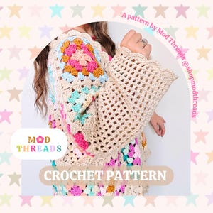 May include: A cream-colored crochet cardigan with colorful square patterns on the shoulders and lower section. The sleeves are open-weave with a scalloped edge. The text "CROCHET PATTERN" is displayed on the bottom of the image.