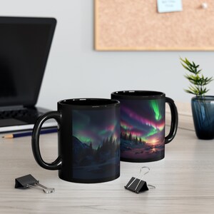 Northern Lights Winter Scene Black Mug 11 oz. Glowing Aurora Borealis mug with Northern Lights in pink and green. Alaska Iceland Canada