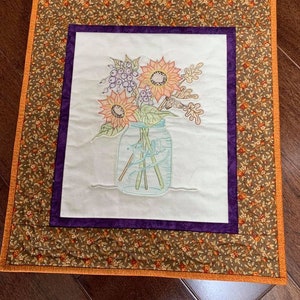 Sunflowers in jar embroidered and colored wall hanging.  A great gift or addition to a home! PRICE REDUCTION!!