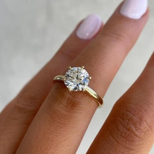 Six Prong Sterling Silver Round Cut CZ Diamond Ring