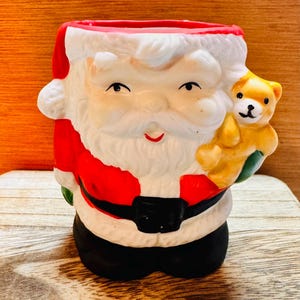 VINTAGE SANTA FIGURINE candle holder
