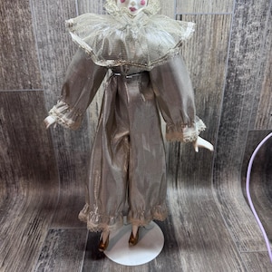 VINTAGE HARLEQUIN DOLL, porcelain, silver clothing