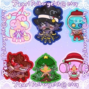 May include: A collection of six colorful cartoon character stickers. The stickers feature various designs, including a unicorn, a character with a top hat, a character in a diving suit, a bull, a character with a star on its head, and a character with pink hair. The text "Pearl Poltergeist @ etsy" is visible.