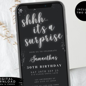 May include: A black and white digital invitation for a 30th birthday party. The invitation features a smartphone screen with the text "shhh... it's a surprise" in white text on a black background. The text "Samantha's 30th Birthday" is also included in white text on a black background. The invitation includes the date and time of the party, as well as the address. The text "Includes Two Sizes" is in white text on a black circle in the upper right corner of the image.